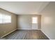 Bright room with neutral walls, window, and an exterior door leading to the outside at 115 Fairview Way, Stockbridge, GA 30281