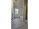 Spacious bathroom boasts a tub and shower combination with a large window at 1525 Racquet Club Dr, Lawrenceville, GA 30043