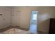 Bedroom entryway showcasing a view to the connected bathroom at 1525 Racquet Club Dr, Lawrenceville, GA 30043