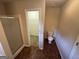 Bathroom with shower and toilet, leading to a walk-in closet at 4551 Mitchells Meadow Ln, Ellenwood, GA 30294