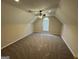 Bedroom featuring neutral walls, carpet, and window with blinds at 4551 Mitchells Meadow Ln, Ellenwood, GA 30294