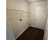 Laundry room with washer hookups and a door to the outside at 4551 Mitchells Meadow Ln, Ellenwood, GA 30294