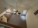 Open-concept living room with fireplace and carpeted floor at 4551 Mitchells Meadow Ln, Ellenwood, GA 30294