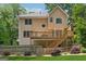 Large backyard with lush sod, tiered wooden deck and fenced in yard at 2622 Murdock, Marietta, GA 30062