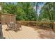 Outdoor deck with a dining set and views of a lush, green backyard at 2622 Murdock, Marietta, GA 30062