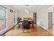Formal dining room with hardwood floors, wainscoting and windows with outdoor views at 2622 Murdock, Marietta, GA 30062