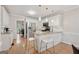 Bright kitchen features granite countertops, stainless appliances, and a breakfast bar with seating at 2622 Murdock, Marietta, GA 30062