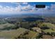 Expansive aerial view of 335 Gum Creek Rd, Roopville, GA, showcasing lush land and serene surroundings at 335 Gum Creek Rd, Roopville, GA 30170
