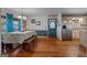 Bright dining area with wood floors, and direct access to the kitchen at 335 Gum Creek Rd, Roopville, GA 30170