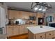Charming kitchen featuring custom cabinets, an island, and modern appliances at 335 Gum Creek Rd, Roopville, GA 30170