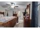 Bright bedroom with hardwood furniture, large windows, and ensuite access at 335 Gum Creek Rd, Roopville, GA 30170