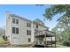 Rear exterior view featuring back deck at 5523 Forest Dr, Loganville, GA 30052