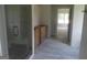 Bright bathroom features a tiled walk-in shower and cabinet with natural wood tone for a blend of modern and rustic style at 49 Durham Estates Dr, Sharpsburg, GA 30277