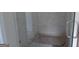 Bathroom featuring glass-enclosed shower, presenting a clean and modern design for a luxurious bathing experience at 49 Durham Estates Dr, Sharpsburg, GA 30277