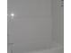 Bathroom with a white bathtub and shower at 49 Durham Estates Dr, Sharpsburg, GA 30277