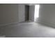 Bedroom with a closet and natural light from a window at 49 Durham Estates Dr, Sharpsburg, GA 30277