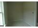 Small bedroom with light colored walls, white trim and a large window at 49 Durham Estates Dr, Sharpsburg, GA 30277