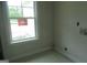 Practical laundry room with natural light and ample space for appliances at 49 Durham Estates Dr, Sharpsburg, GA 30277