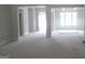 Living room with natural light and an open floor plan at 49 Durham Estates Dr, Sharpsburg, GA 30277