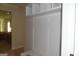 Mudroom with white shelves, storage space, and bench seating at 49 Durham Estates Dr, Sharpsburg, GA 30277