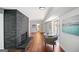 Finished basement with fireplace and hardwood floors, with seating area and a view to the bathroom at 2541 Peyton Woods Sw Trl, Atlanta, GA 30311