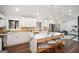 Bright kitchen with a large island, stainless steel appliances, and white cabinetry at 2541 Peyton Woods Sw Trl, Atlanta, GA 30311
