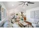 Bright living room with hardwood floors, modern furnishings, and ample natural light at 2541 Peyton Woods Sw Trl, Atlanta, GA 30311