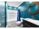 Stylish bathroom featuring a modern vanity, updated fixtures, and a bathtub with shower at 101 Jasmine Path, Peachtree City, GA 30269