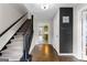 Inviting foyer featuring staircase and chalkboard wall, leading to the home's interior spaces at 101 Jasmine Path, Peachtree City, GA 30269