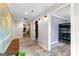 Spacious hallway showcasing the home's open layout, hardwood floors, and natural light at 101 Jasmine Path, Peachtree City, GA 30269