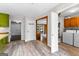View from kitchen into laundry room with appliances and closet at 101 Jasmine Path, Peachtree City, GA 30269