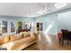 Spacious sunroom featuring tile floors, skylights and a cozy seating area at 101 Jasmine Path, Peachtree City, GA 30269