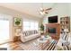 Bright and inviting living room with a vaulted ceiling, fireplace, and stylish decor at 1416 Emerald Pine Ct, Lawrenceville, GA 30043