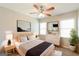 Serene main bedroom with a comfortable bed, soft lighting, and stylish decor at 1416 Emerald Pine Ct, Lawrenceville, GA 30043