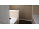 Bathroom featuring tub, with natural wood-look flooring at 5799 Eagles Feather Ln, Riverdale, GA 30274