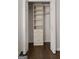 Walk-in closet with custom shelving and drawers for optimal storage in a modern design at 1260 Heards Ferry Rd, Sandy Springs, GA 30328