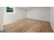 A room featuring wood floors and a window at 1260 Heards Ferry Rd, Sandy Springs, GA 30328