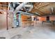 Unfinished basement area with exposed mechanicals and a workbench at 465 Willowbrook Dr, Smyrna, GA 30082