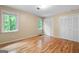 Bedroom featuring hardwood floors, bright windows, white trim, and plenty of natural light at 465 Willowbrook Dr, Smyrna, GA 30082