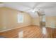Spacious bedroom features gleaming hardwood floors and a ceiling fan at 465 Willowbrook Dr, Smyrna, GA 30082