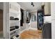 Walk-in closet with custom shelves and built-in laundry at 465 Willowbrook Dr, Smyrna, GA 30082