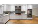Gourmet kitchen with stainless steel appliances, custom cabinetry and sleek countertops at 465 Willowbrook Dr, Smyrna, GA 30082