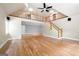 Sun-filled living room with hardwood floors, high ceilings, and a loft overlooking the space at 465 Willowbrook Dr, Smyrna, GA 30082