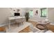 Bright home office with hardwood floors, featuring an ergonomic workspace and natural light at 465 Willowbrook Dr, Smyrna, GA 30082