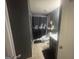 Cozy bathroom with a black shower curtain and sink at 7644 Wrotham Cir, South Fulton, GA 30349