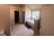 Bright bathroom features a soaking tub, tiled floors, and neutral color palette at 7644 Wrotham Cir, South Fulton, GA 30349