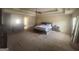 Large main bedroom with sitting area, tray ceilings, and en-suite bathroom at 7644 Wrotham Cir, South Fulton, GA 30349