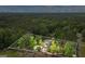 Expansive property showcasing a charming home, verdant lawn, and inviting pool area enclosed by a defined boundary line at 171 Ponderosa Drive, Fayetteville, GA 30214