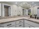 Bathroom featuring granite countertops, double sinks, and white cabinets at 171 Ponderosa Drive, Fayetteville, GA 30214