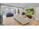 Open concept primary bedroom with sitting area, natural light, and tray ceilings at 171 Ponderosa Drive, Fayetteville, GA 30214